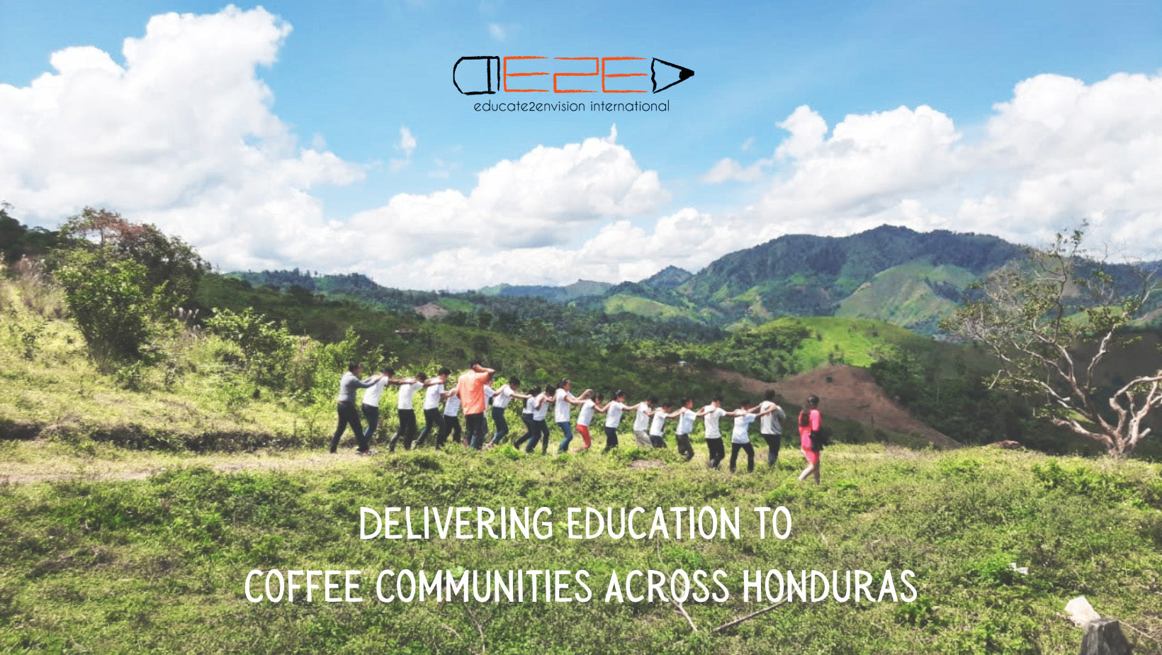 Children playing in a field in rural Honduras under the banner of Educate2Envision: Delivering Education to Coffee Communities Across Honduras.