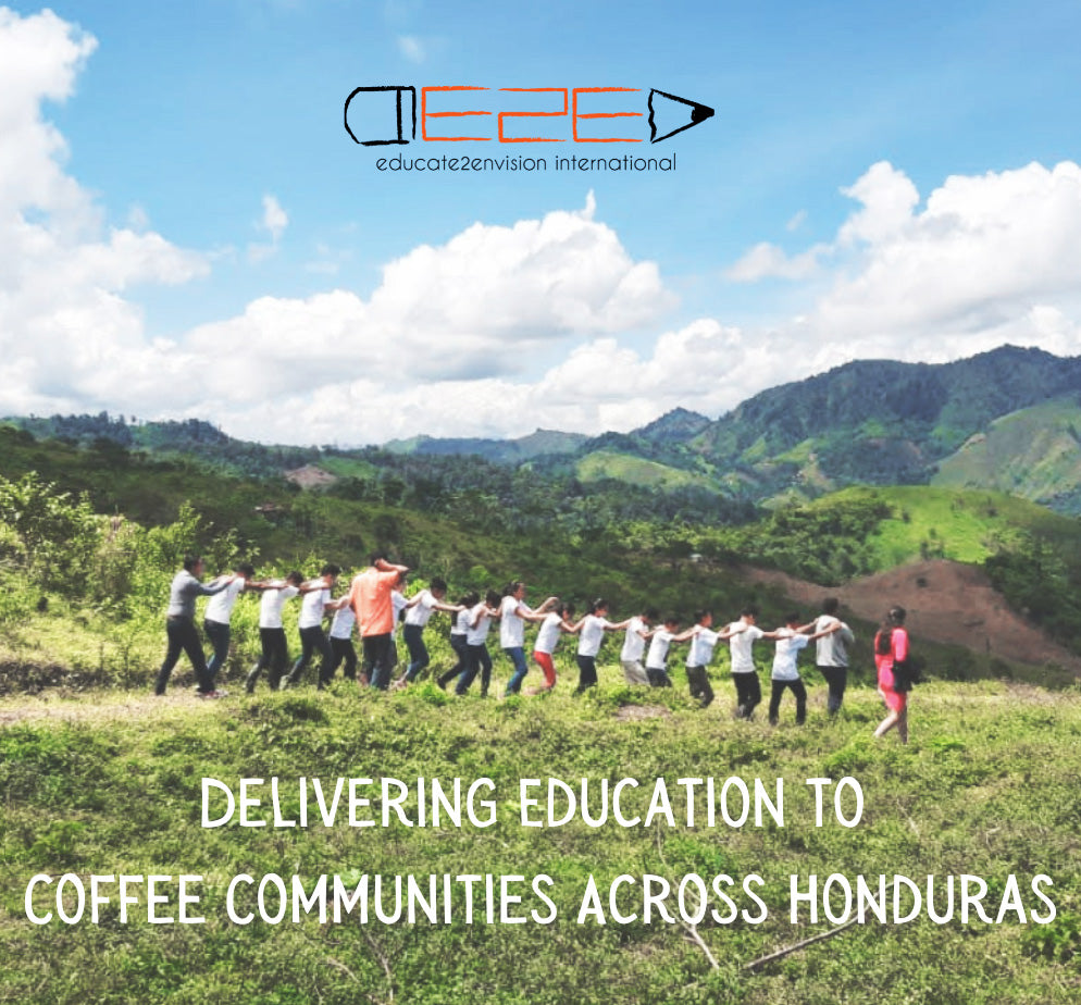 Children playing in a field in rural Honduras under the banner of Educate2Envision: Delivering Education to Coffee Communities Across Honduras.